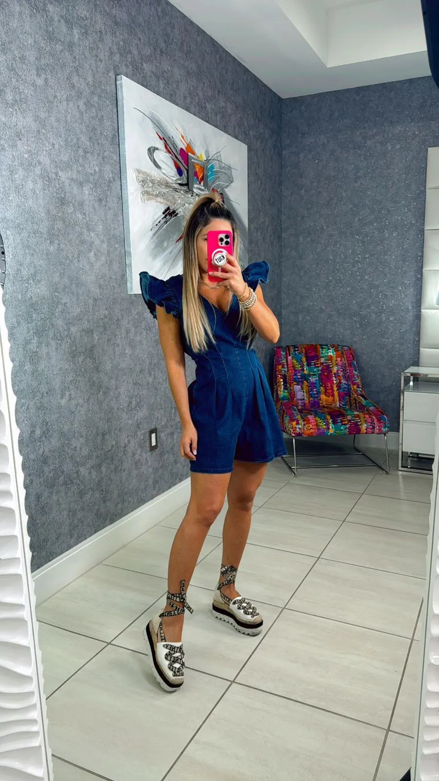8216 Denim romper with V-neckline