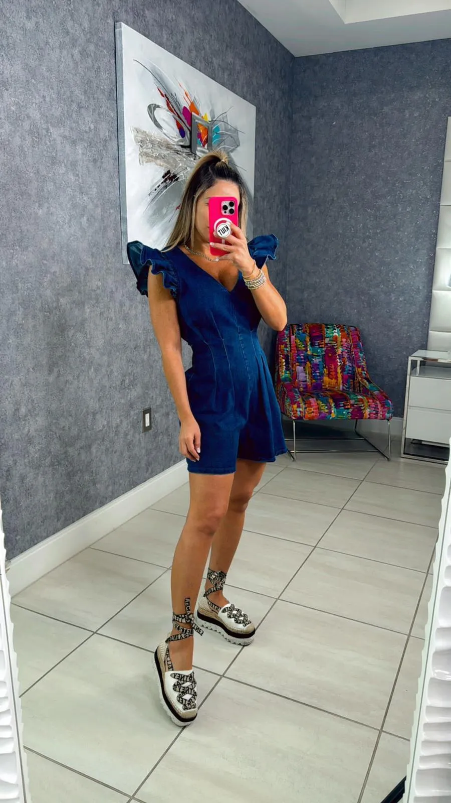 8216 Denim romper with V-neckline